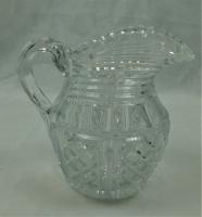 A Regency period crystal glass pint size jug, Anglo Irish circa 1810