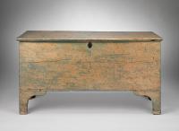 An Unusual Georgian  Six Plank Painted Chest  With Original Oval Escutcheon and Raised on Bracket Feet  Pine with Historic Duck Egg Blue Buttermilk Painted Surfaces  English, c.1800