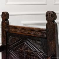 A 16th century English joined oak child's high chair 