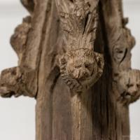 three carved oak medieval crocketed finials on a painted stand