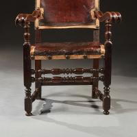 Pair of 17th Century Italian Baroque Parcel-gilt Walnut Leather Armchairs