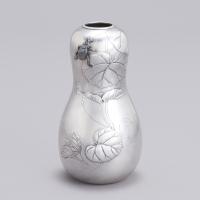 Japanese silver vase with a beetle signed Hojo and Chorakusai with Jungin mark, Showa Period.
