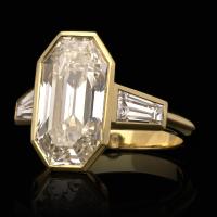 emerald cut diamond bezel set ring