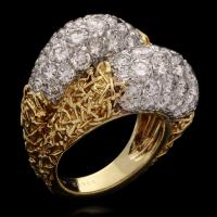 vintage gold and diamond cross over ring by Van Cleef & Arpels