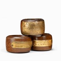 A collection of napkin rings made from ships’ timbers