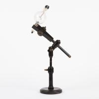 Early X-ray tube on an articulated stand, circa 1900