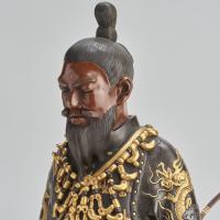 A stunning antique Japanese Bronze and multi-metal Okimono group depicting Emperor Jimmu