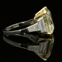 Hancocks 8.73ct Vintage Emerald-Cut Pale Yellow Diamond Ring With Diamond Shoulders