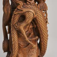 A beautiful, late 19th Japanese Century wood carving Okimono of Ryujin, God of the Sea