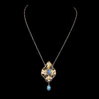 An arts and crafts gold moonstone pendant