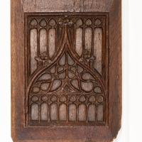 A late medieval carved oak panel, detail
