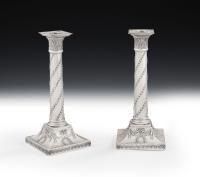 A very unusual pair of George III Neo Classical Candlesticks made in Sheffield in 1775 by John Winter & Company