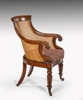 William IV carved mahogany bergere armchair