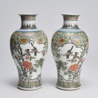 An attractive pair of Nineteenth Century Chinese Famille Verte porcelain vases