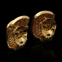 gold and diamond earrings by Van Cleef & Arpels