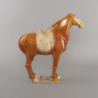 Chinese pottery amber glazed standing horse, Tang dynasty, 8th century