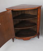 Dutch kingwood and marquetry corner-cupboards