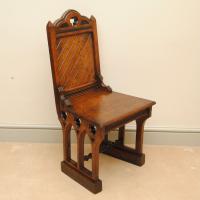 A Pair of 19th Century Gothic Design Pitch Pine Hall Chairs