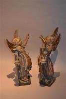 A rare pair of carved and polychromed angels