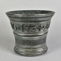 An unusual bronze mortar bearing the dates 1734 and 1644. Circa 1734