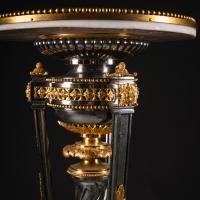 Louis XVI style gilt-bronze and polished steel pedestal table