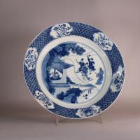 front of blue and white kangxi plate
