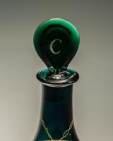 A Very Rare Green Decanter Labelled Cappillaire