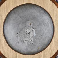Japanese shibuichi plaque with the God Jurojin signed Sekiguchi Ichiya, Taisho Period