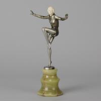 Art Deco Cold Painted Bronze and Ivory Sculpture entitled "Arms Out" by Lorenzl