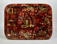 Regency red ground papier mache tray on later stand, circa 1810