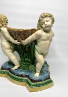 Minton majolica cherub basket, dated 1863