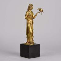 Early 20th Century Art Deco Bronze entitled "Femme avec Oiseau" by Pierre Laurel