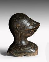 Coulborn antique patinated carved wood armet