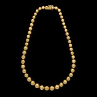 Tiffany & Co. An 18ct Gold Graduated Bead Necklace Circa 1980s