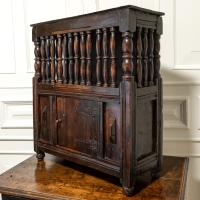 A rare, small, Charles II fruitwood mural ventilated livery cupboard, circa 1660