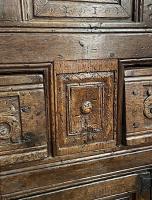 A MAGNIFICENT AND RARE HENRY VIII ENGLISH OAK AUMBRY