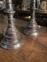 A RARE AND IMPRESSIVE PAIR OF 15th CENTURY OAK PRICKET CANDLESTICKS