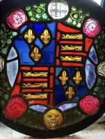 A RARE ELIZABETHAN STAINED GLASS CIRCULAR WINDOW PANEL
