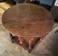 A WONDERFUL AND UNUSUAL 17th CENTURY WESTMORLAND OAK FOLDING TABLE