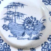 English Delftware Plates decorated in Underglaze Blue with Lotus Flowers, Probably London