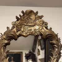 An Unusual Large Carved Giltwood Wall Mirror