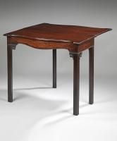 Chippendale carved mahogany serpentine tea table