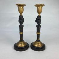 Pair of Bronze and Ormolu Putti Candlesticks