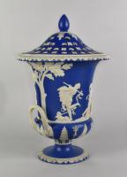 An impressive pair of Wedgwood blue and white Jasper urns, covers and liners, c.1800