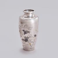 Japanese silver vase with peonies and a sparrow signed Hiroteru, Taisho Period