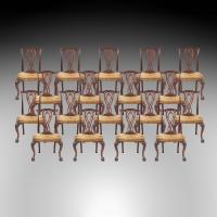 A Long Set of Eighteen Dining Chairs in the Early Georgian Manner