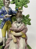 Staffordshire pottery bocage group, ‘Hairdresser’, circa 1820
