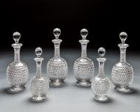 An Elaborately Cut Suite of Decanter