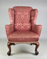 George II red walnut cabriole leg wing chair on claw and ball feet, circa 1740