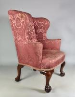 George II red walnut cabriole leg wing chair on claw and ball feet, circa 1740